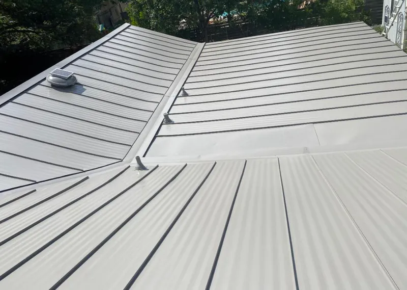 Solar attic fan installed on a metal roof for Roof Ventilation in Bay Point
